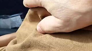 Amateurs explore braless nipples in a casual, intimate setting.