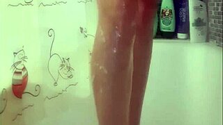 Why does this busty teen wash her perfect feet so seductively in the shower?