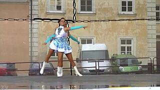 two nice majorettes performing cheerleading routines
