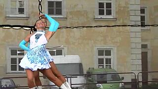 two nice majorettes performing cheerleading routines