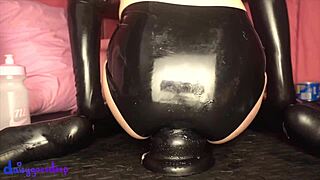 Solo performer uses huge dildo for fisting and anal stretching