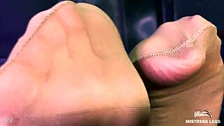 beautiful mistress teases with feet and ass in pantyhose, close up view