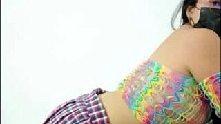 She opens up and slides pink dildo in wet pussy