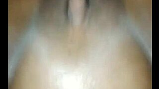 Amateur couple enjoys intimate moments in a private setting