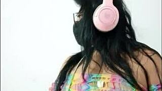 She opens up and slides pink dildo in wet pussy