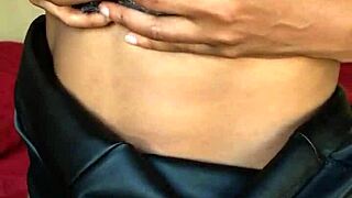 Ebony milf teases with vibrator before wetting herself