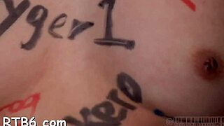 a clamped chick receives a lusty facial castigation in bondage