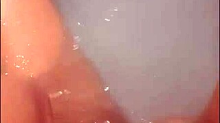 Pretty Blonde Woman Teases in Hot Tub Until Loud Cumshot