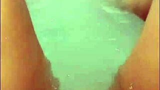 Pretty Blonde Woman Teases in Hot Tub Until Loud Cumshot