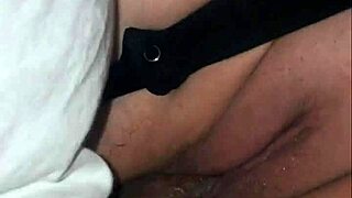 Chubby woman having fun with her partner on the bed, enjoying every moment