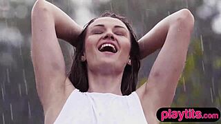 Petite Ukrainian milf strips nude in rain. Her bubble butt shines through the wet scene!