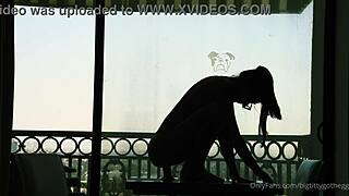 bigtittygothegg rides her dildo in silhouette, showing off shaved pussy