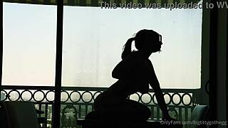 bigtittygothegg rides her dildo in silhouette, showing off shaved pussy