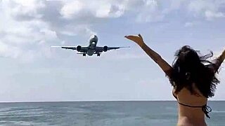 monika fox poses in pink bikini on beach