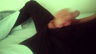 Horny guy in black pants moaning and jerking off his big cock after work until he cums