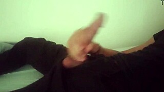 Horny guy in black pants moaning and jerking off his big cock after work until he cums