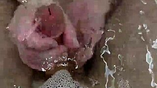 Bath handjob leads to hot underwater cumshot!