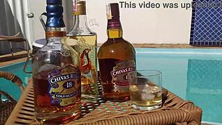 In the pool, a Latina redhead takes a big anal creampie from monster cock