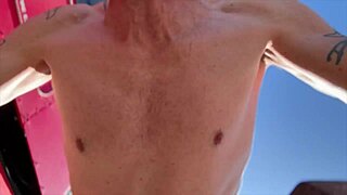 Blonde pornstar flaunts her bubble butt at the beach party.