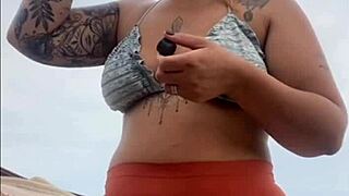 African Exhibitionist Flashes Swollen Pussy On Beach