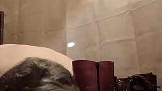 Slave Flashes Boots While Bent Over In Exhibitionist Scene