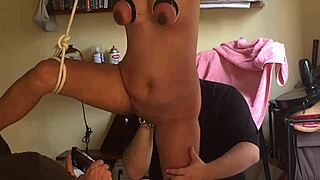 Intense fist fucking milf in hogtied bdsm.