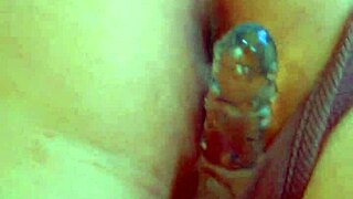 Check out this desi beauty using a glass dildo up close!