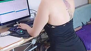 blonde secretary with tattoos on webcam