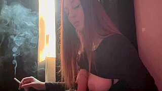 italian milf artemisia love gives dildo handjob to big tits while smoking cigarette in fetish scene