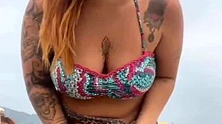 young african girl gets naked on beach, grabs guy's hard cock