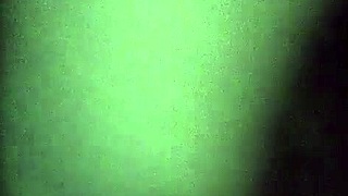 Walking in the woods wearing only a g-string and fishnet stockings, enjoying nature.