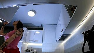 hottest redhead tattooed cheerleader in over knee socks shows see through panties in the kitchen