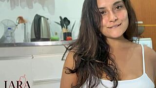 Hot neighbor cooks while wearing interactive anal plug vibrator