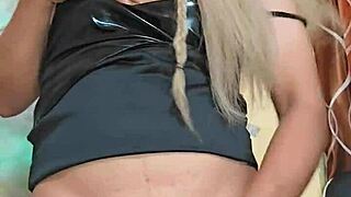 transsexual in sexy clothes masturbates