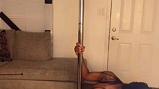 Ebony Divine with huge pole shakes her fat ass and big tits on the pole!