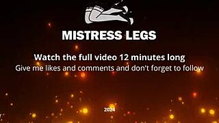 Goddess spreads curly feet in white socks on spring grass field