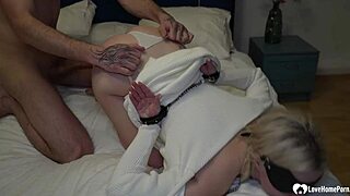 Blindfolded blonde rides that hard cock while getting spanked in homemade BDSM fun 😈