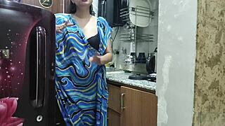 indian stepmom watches and enters her stepsons kitchen to check on him