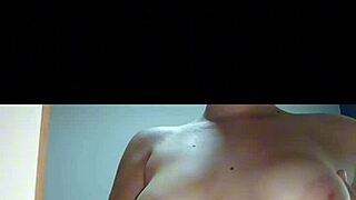 Teen girl teases big tits in mirror