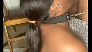 thick ebony slut with large natural tits wearing fishnets collared and leashed while fucked