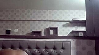 Young woman explores self in boarding room with stepmother