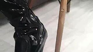 veve performs balloon popping in latex stockings