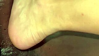 I give a relaxing foot massage to the muscular bodybuilder