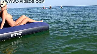 nude beach girl with big boobs and dolphin tattoo enjoys public outdoor fun