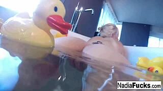 Sexy Nadia Enjoys a Bath with Rubber Duckies While Masturbating