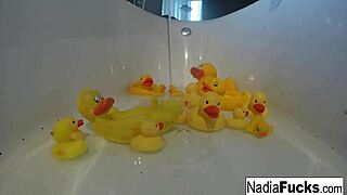 Sexy Nadia Enjoys a Bath with Rubber Duckies While Masturbating