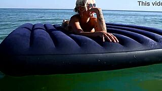 nude beach girl with big boobs and dolphin tattoo enjoys public outdoor fun