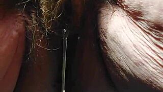 Granny uses cucumber in hairy pussy!