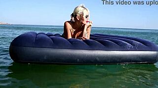 nude beach girl with big boobs and dolphin tattoo enjoys public outdoor fun