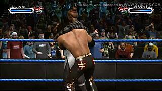 Marrisa battles John Morrison in an intense wrestling match with fetish elements. Action-packed showdown unfolds.